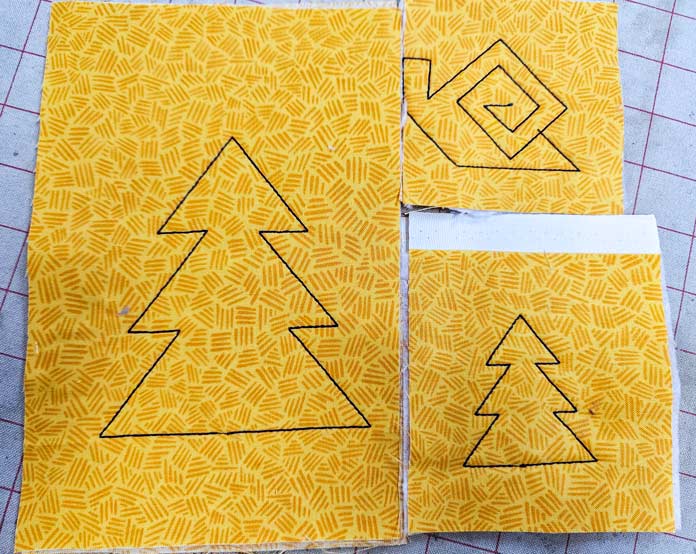 Outlines on yellow fabric