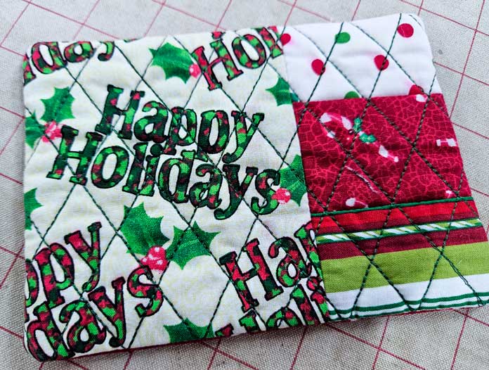 Christmas themed fabric; HeatnBond Lite, quilt binding, fusible web, fabric crafts