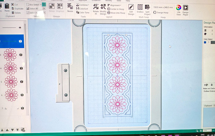 A computer screen with red motifs; Creativate Embroidery Software