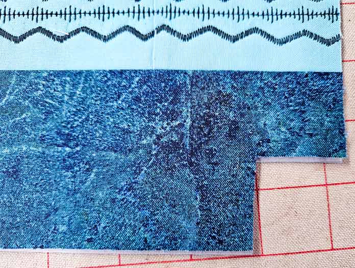 Blue fabric with the corner cut out