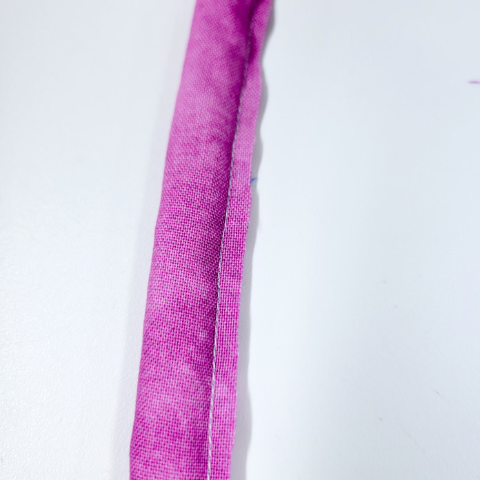 A tube of pink fabric