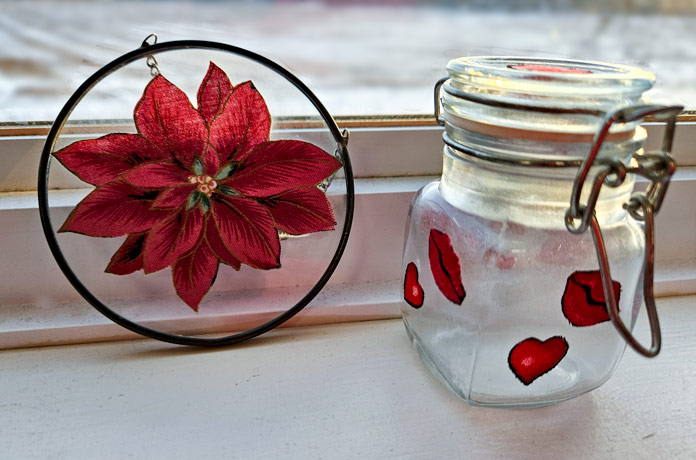 A poinsettia in a glass circle and a jar with red lips; Bosal In-R-Form Double-Sided Fusible Foam Stabilizer, Bosal In-R-Form Double Sided Fusible Foam Stabilizer, Bosal In-R-Form Double Sided Fusible Foam Stabilizer, Bosal In-R-Form Unique Sew-In Foam Stabilizer, HeatnBond Tricot Medium Weight Fusible Interfacing, UNIQUE Crafters Choice Fusible Backing, HeatnBond Non-Woven Light Weight Fusible Interfacing, HeatnBond Tricot Medium Weight Fusible Interfacing