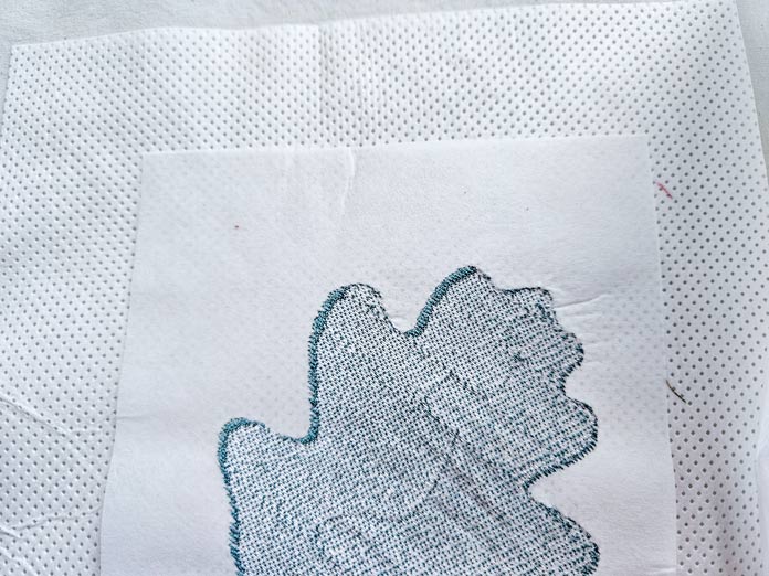 Two different white paper with white stitching