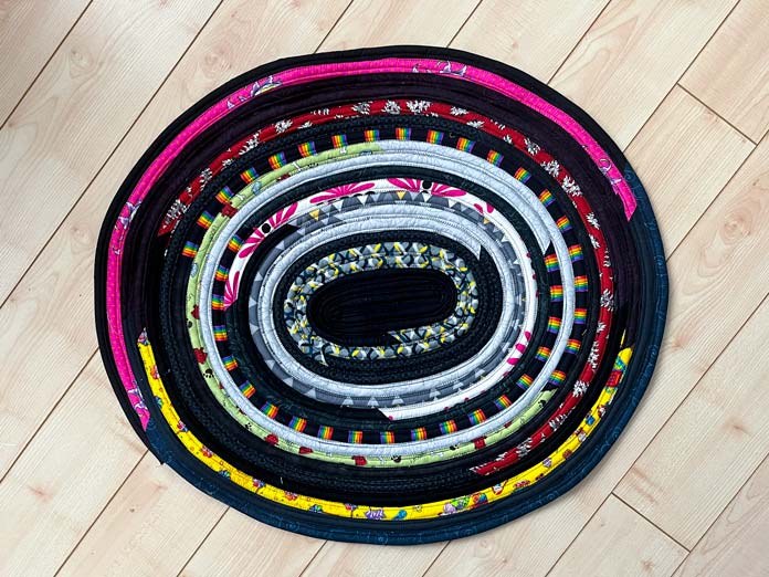The colorful oval mat is completed.