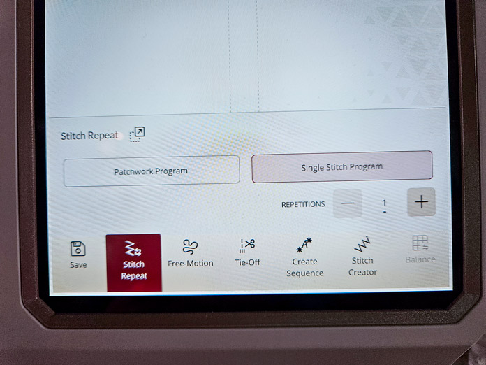 A screen on a computerized sewing machine showing the Stitch Repeat tool. Husqvarna VIKING DESIGNER EPIC 3 sewing and embroidery machine, Husqvarna VIKING 6in/15.2cm Applique Scissor, Husqvarna VIKING Open Toe Presser Foot for IDF System, SULKY Slimline Metallic Dream Assortment