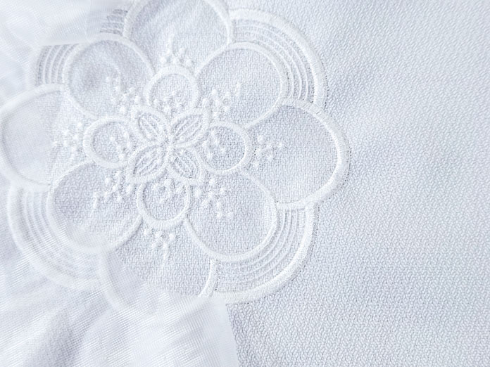 White stitching on white fabric