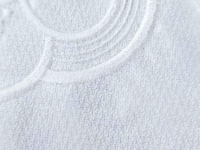 White stitching on white fabric