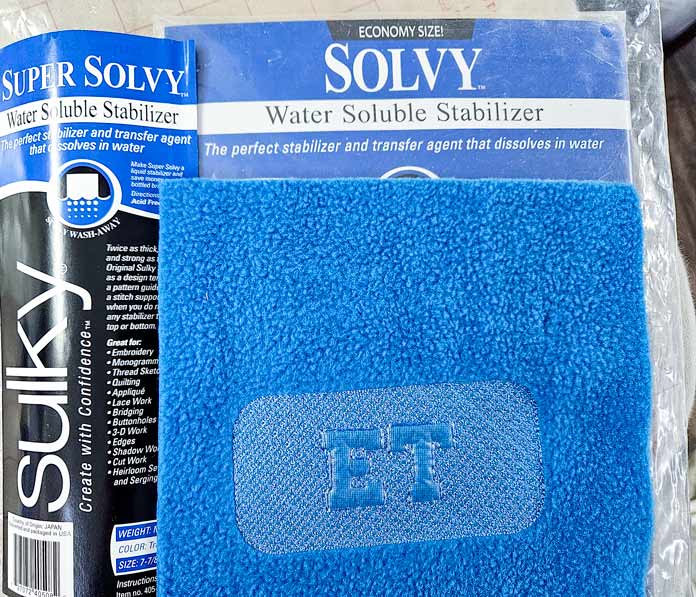 Blue stitches on blue fabric
