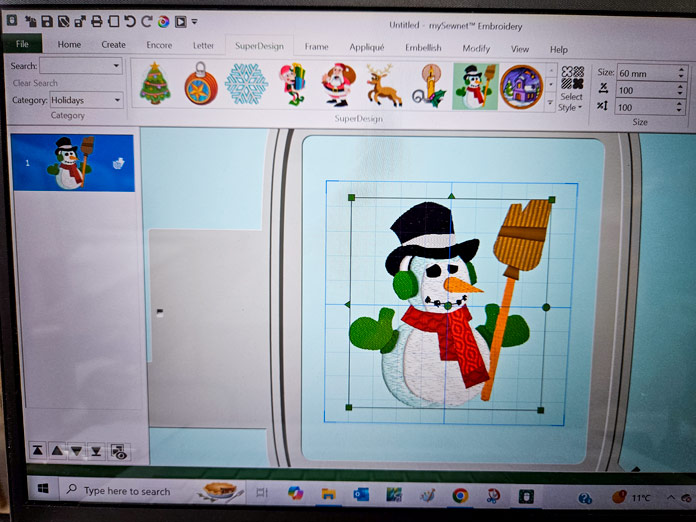 A snowman in embroidery software on a computer screen; Husqvarna VIKING Designer Quartz 29, mySewnet Machine Embroidery Software, mySewnet Library, Husqvarna VIKING Tear-a-Way Light Stabilizer 15 Inches x 25 Yards