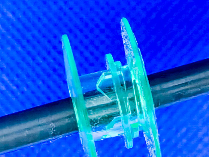 A close-up of a sewing machine bobbin 