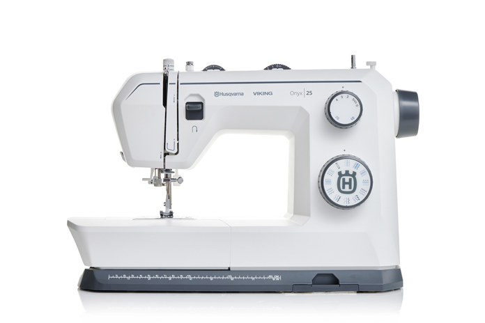 A white and grey sewing machine