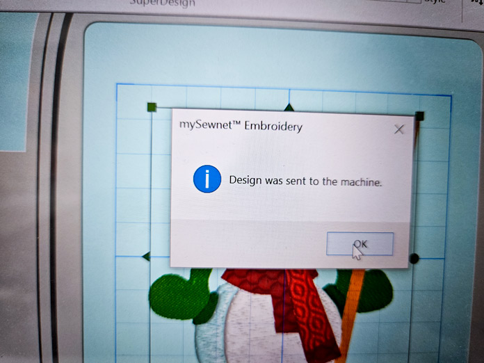 A pop-up message on a computer screen confirming that an embroidery design was sent to a machine; Husqvarna VIKING Designer Quartz 29, mySewnet Machine Embroidery Software, mySewnet Library, Husqvarna VIKING Tear-a-Way Light Stabilizer 15 Inches x 25 Yards