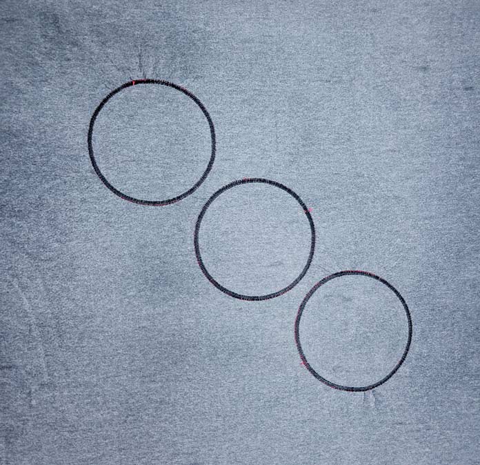 Three black circular outlines