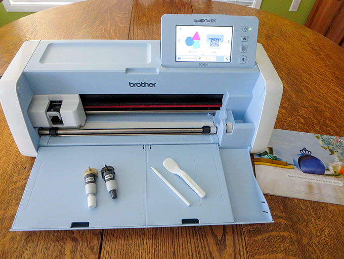 Brother ScanNCut SDX225 with 2 cutting blades, stylus and spatula; Brother ScanNCut SDX225, Brother BQ3050 sewing machine, Brother brayer, Brother spatula, Brother standard tack cutting mat 