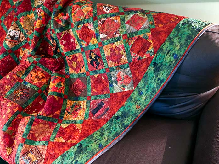 A completed quilt is shown with a flange.