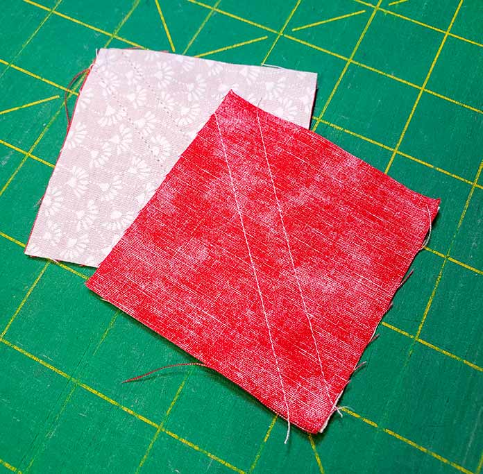 Two lines of stitching on the half-square triangle
