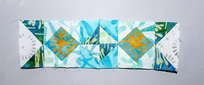 Two Step 8 units stitched to a step 13 unit. Block 11 of the Spectrum QAL 2020 made with The Little Girl in the Blue Armchair collection by Anthology Fabrics.
