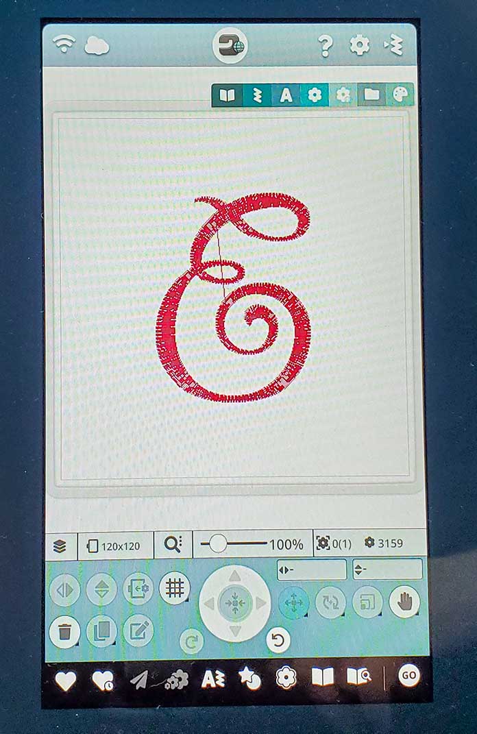 The letter E from the Elegant Script font in mySewnet™ Library on the Husqvarna Viking Designer Sapphire™ 85
