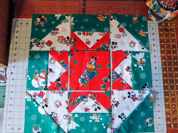 piecing-star-churn-quilt-blocks-together-using-the-pfaff-performance-icon-quiltsocial