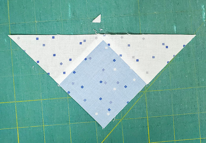 The pieced triangle using the Blue Stitch collection by Riley Blake Designs