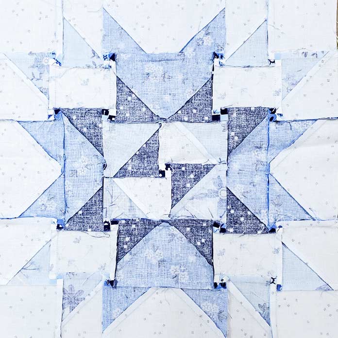 The back of the blue and white quilt block using Blue Stitch by Riley Blake Designs