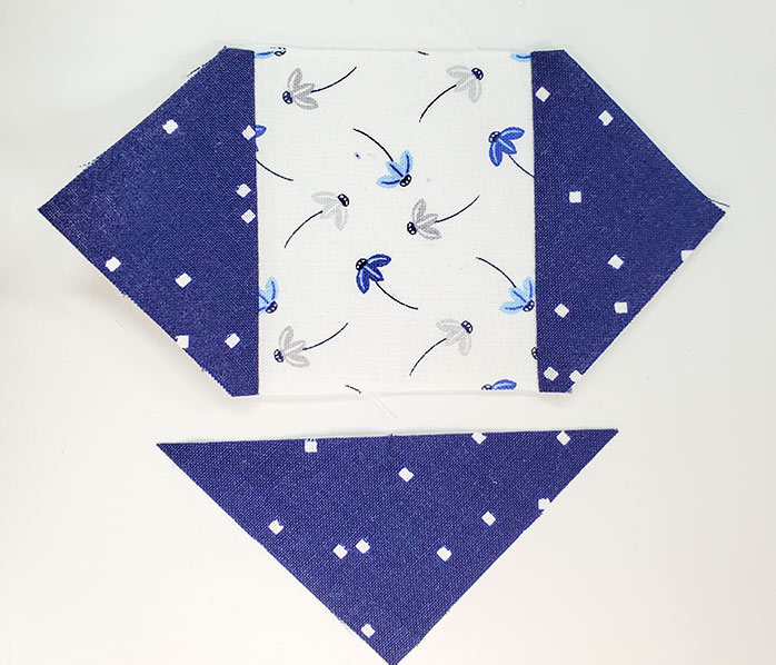 The center unit of the quilt block made with the Blue Stitch collection by Riley Blake Designs. Block 10 of the Spectrum QAL 2020 made with the Blue Stitch collection by Riley Blake Designs.