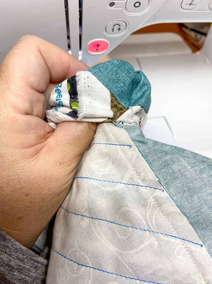 Turn the bag right side out through the unstitched section and put the lining inside the bag.