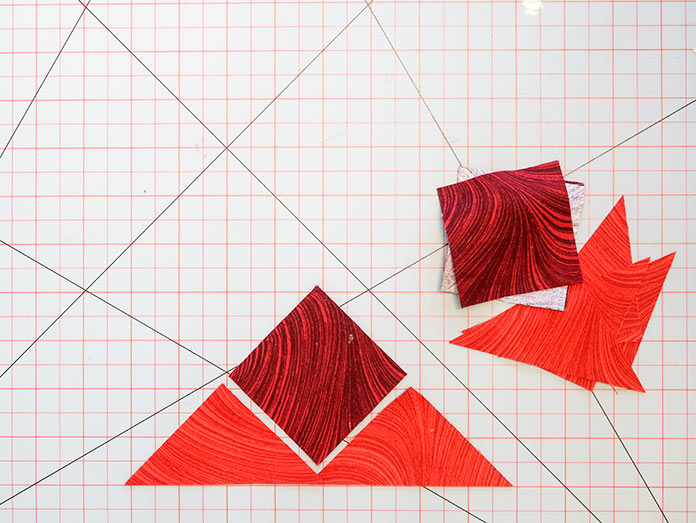  Place two Fabric B triangles on each of two perpendicular sides of one piece of Fabric C to create a BCB unit. Block 8 Spectrum QAL 2020 quilt design features fabrics from the Benartex Wave Texture collection.