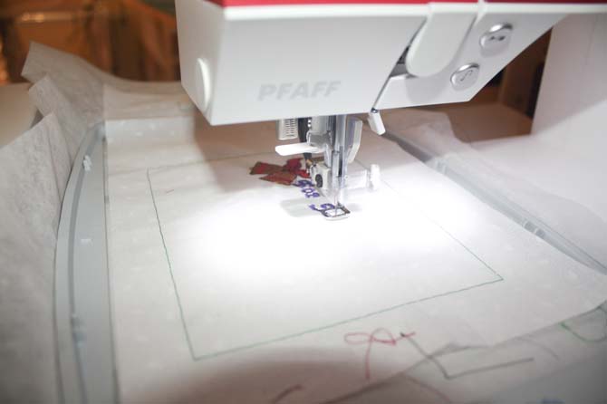 Starting the embroidery for the quilt label