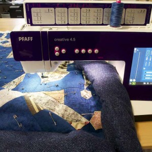 Quilt rolled and in machine