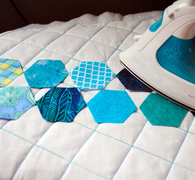 Ironing down the hexagon appliques