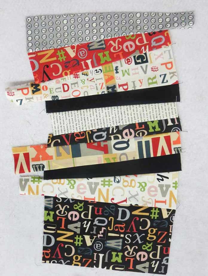 Leftover strips and scraps used to make a strip set