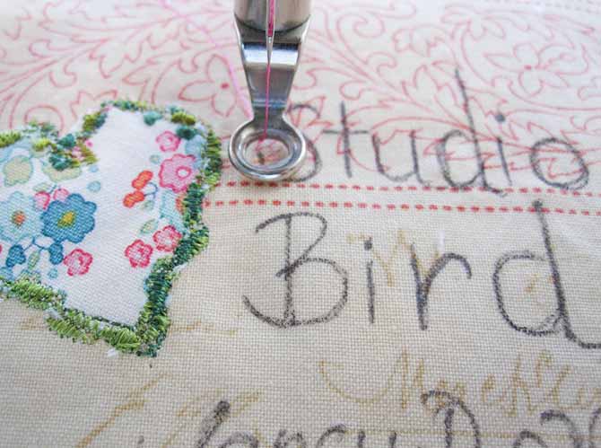 Machine set up to embroider a label for the Studio Bird mini quilt. WonderFil Specialty Threads.