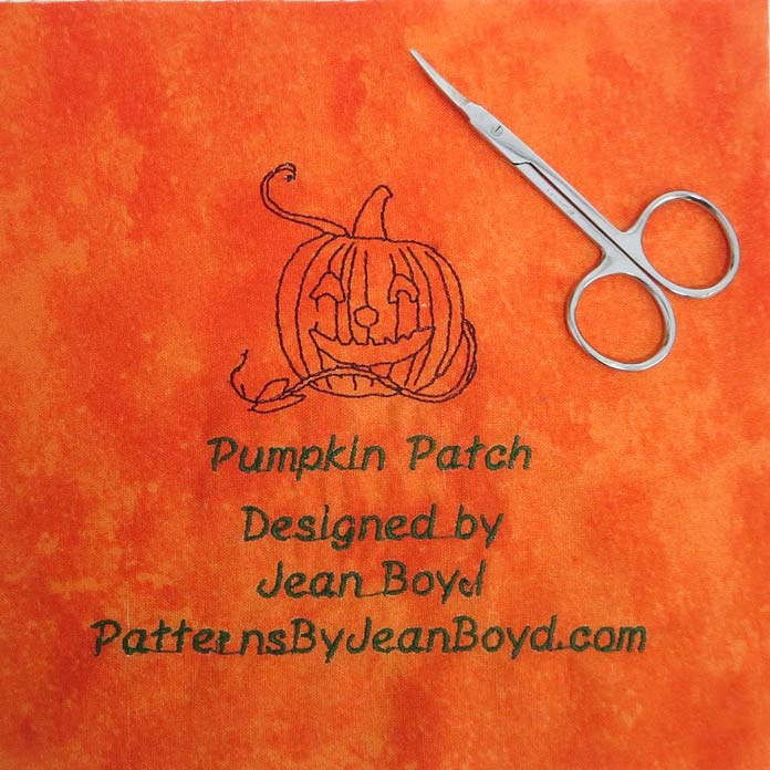 Label for the Pumpkin Patch quilt. Use manicure scissors to remove the jump stitches between the letters