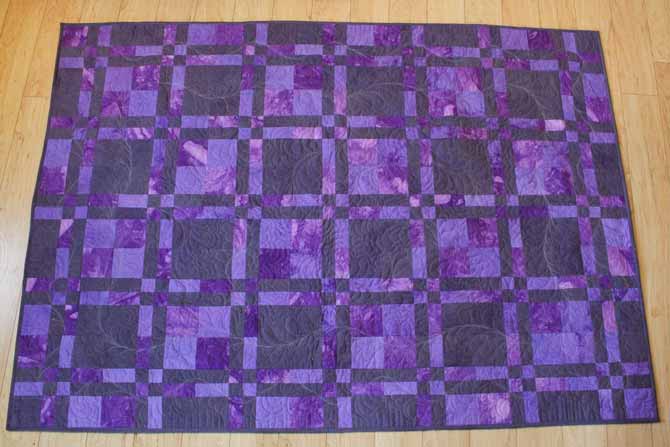 The lovely purple and greys hand dyed with Dylon Permanent Fabric dyes show up beautifully in Marina's grad quilt.