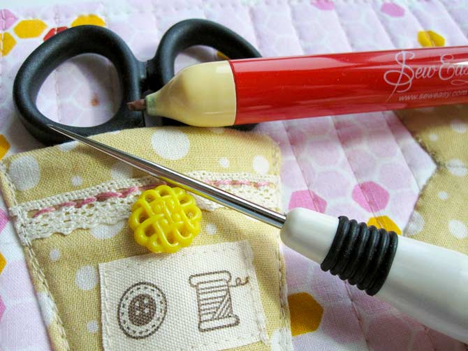 Mark the position of the cord in the scissor holder, and use a tailor's awl to create holes for the cord.