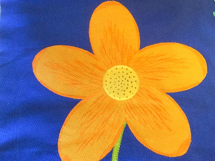 Our applique flower stitched with decorative stitches