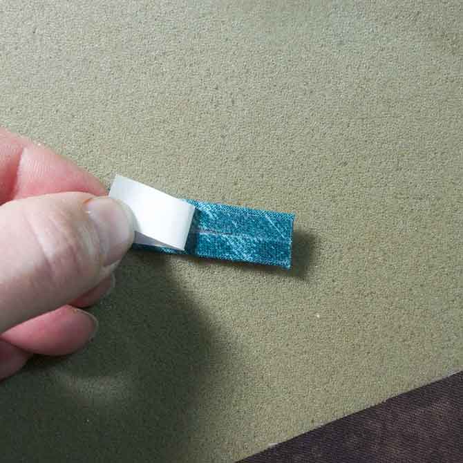 Peel back paper backing to reveal glue