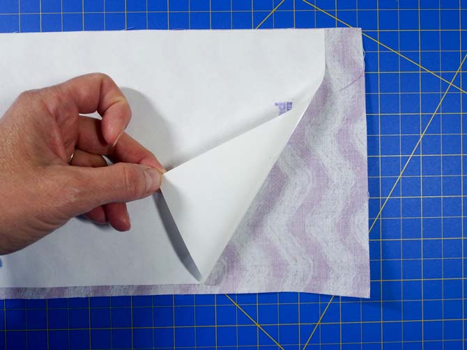 Peeling paper backing off