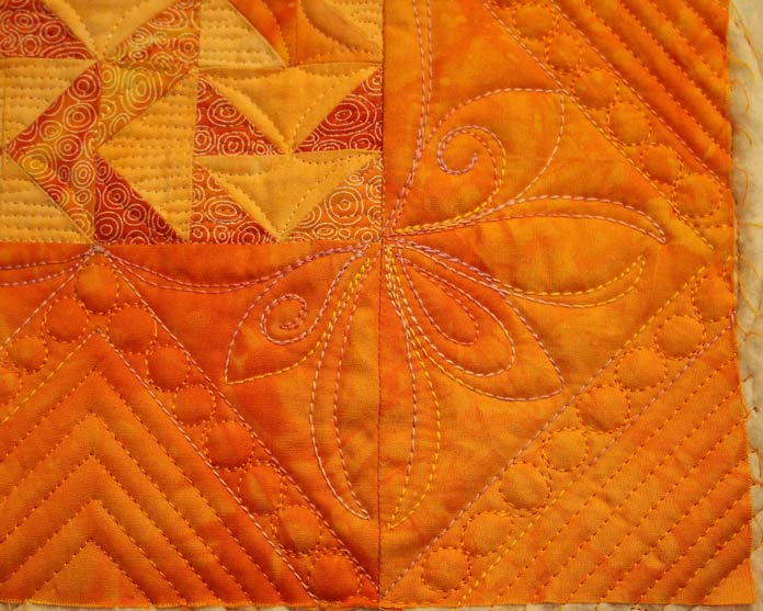 The border for the Persevere Walhanging was quilted with Accent and Fruitti threads.