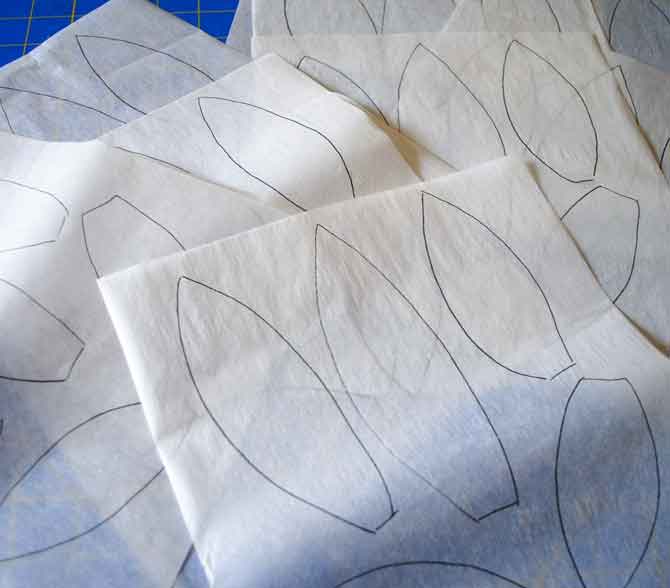 Petal shapes ready to iron to the fabrics