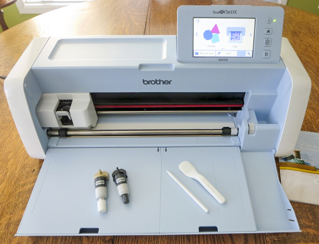 Brother ScanNCut SDX225, Brother BQ3050 sewing machine, Brother brayer, Brother spatula, Brother standard tack cutting mat, color pen set, Brother universal pen holder