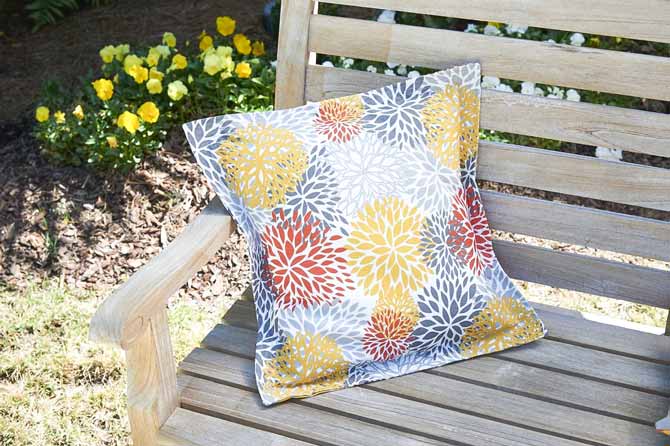 Stitched Flange Cushion Cover on a bench made using Coats Outdoor Thread