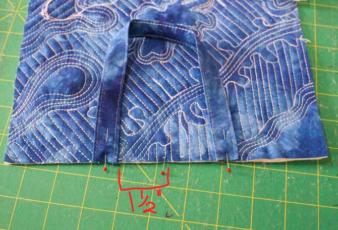 Pin straps 1½" either side of center at the top of the bag