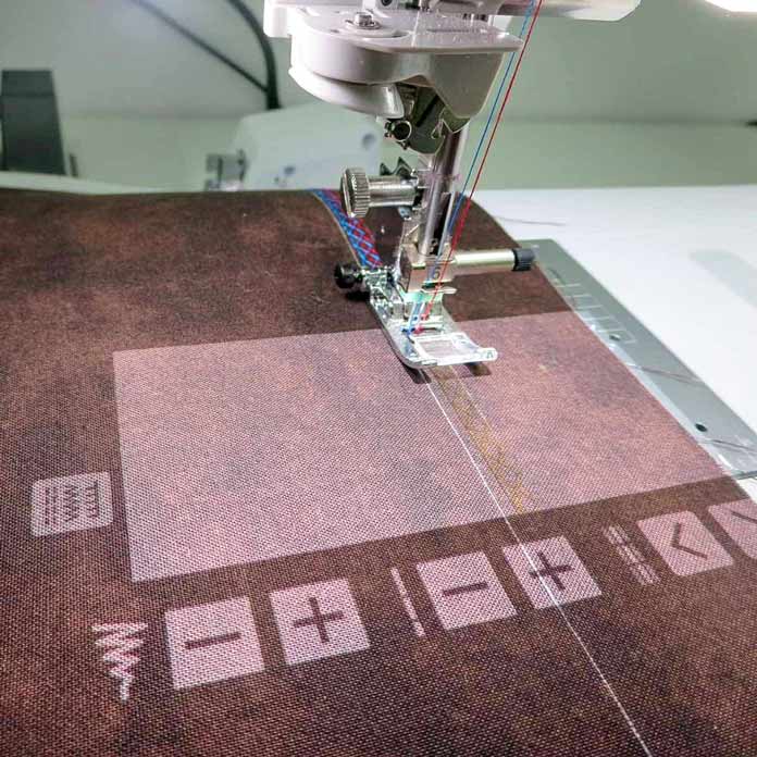 The projector feature shows the decorative stitch exactly how it will look on the fabric.