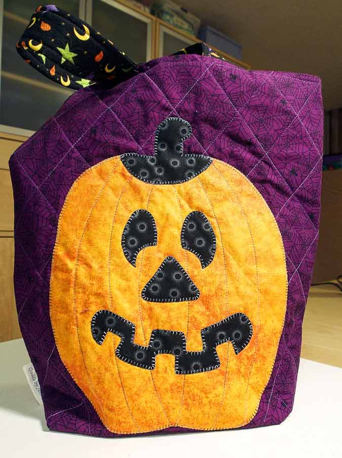 The pumpkin side of the bag