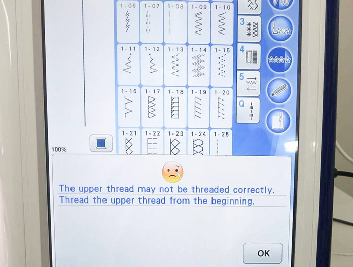 Message on the LCD screen to say that you need to re-thread the machine