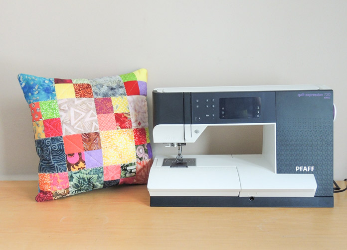 Reverse patchwork side of cushion with PFAFF quilt expression 720