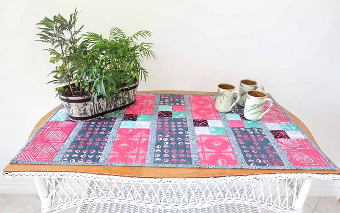 Finished table runner made with Banyan Batiks Tie one On fat quarters