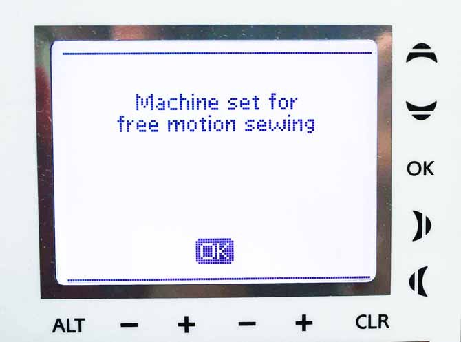 Pop up message that sewing machine is set for free motion quilting
